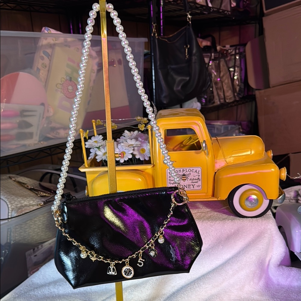 Chic Black Bag with Pearl Strap and Gold Charms